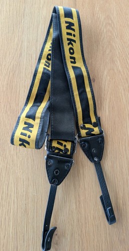 Black and yellow camera - black,